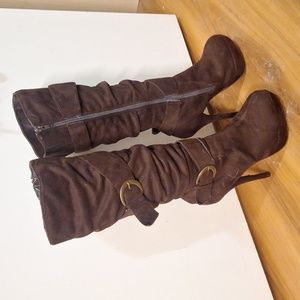 Brown high heel below the knee boots size 7.5